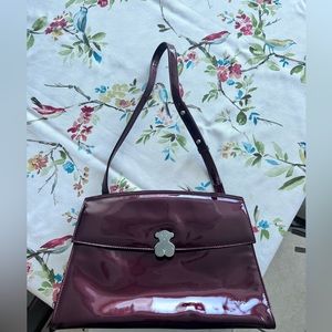 Medium Tous purse. Color red wine